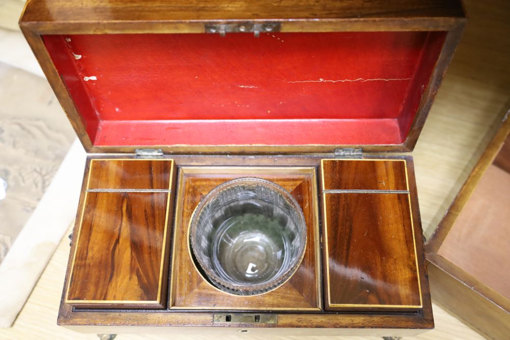 An early 19th century mahogany sarcophagus shape tea caddy with gilt metal mounts, 32cm, and a 19th century writing / work box, width 3